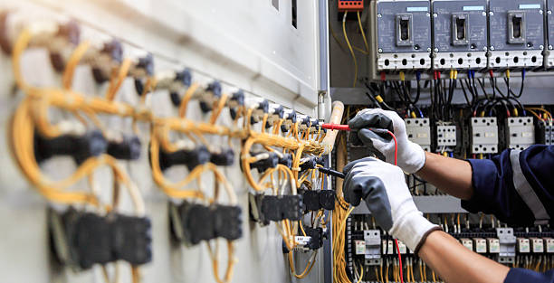 Professional Electrician technician working in Warson Woods, MO